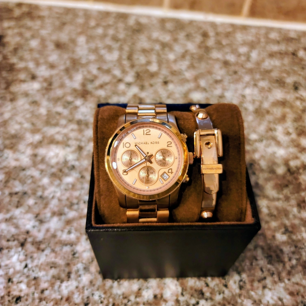 Michael Kors Runway Rose Gold watch with matching Astor buckle bangle bracelet.